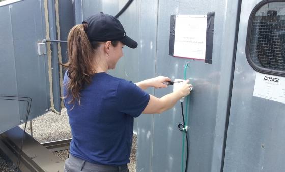 Women installing monitors 